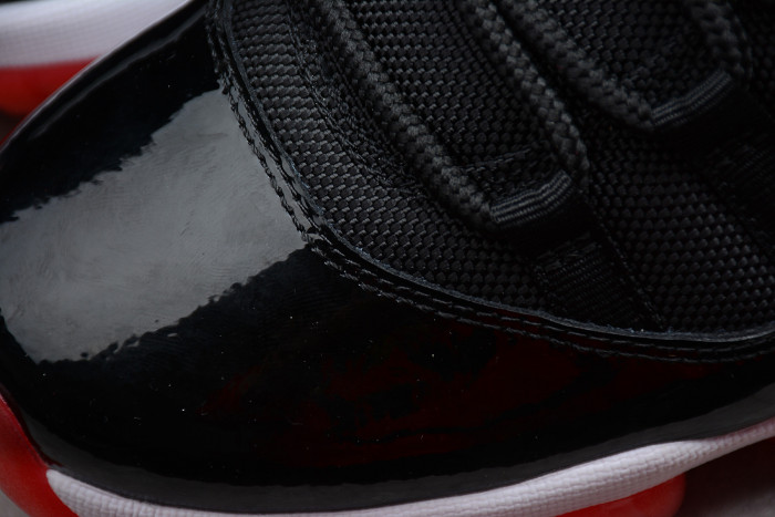 Air Jordan 11 Retro Low "Bred" Black/ Red mens 528895-012